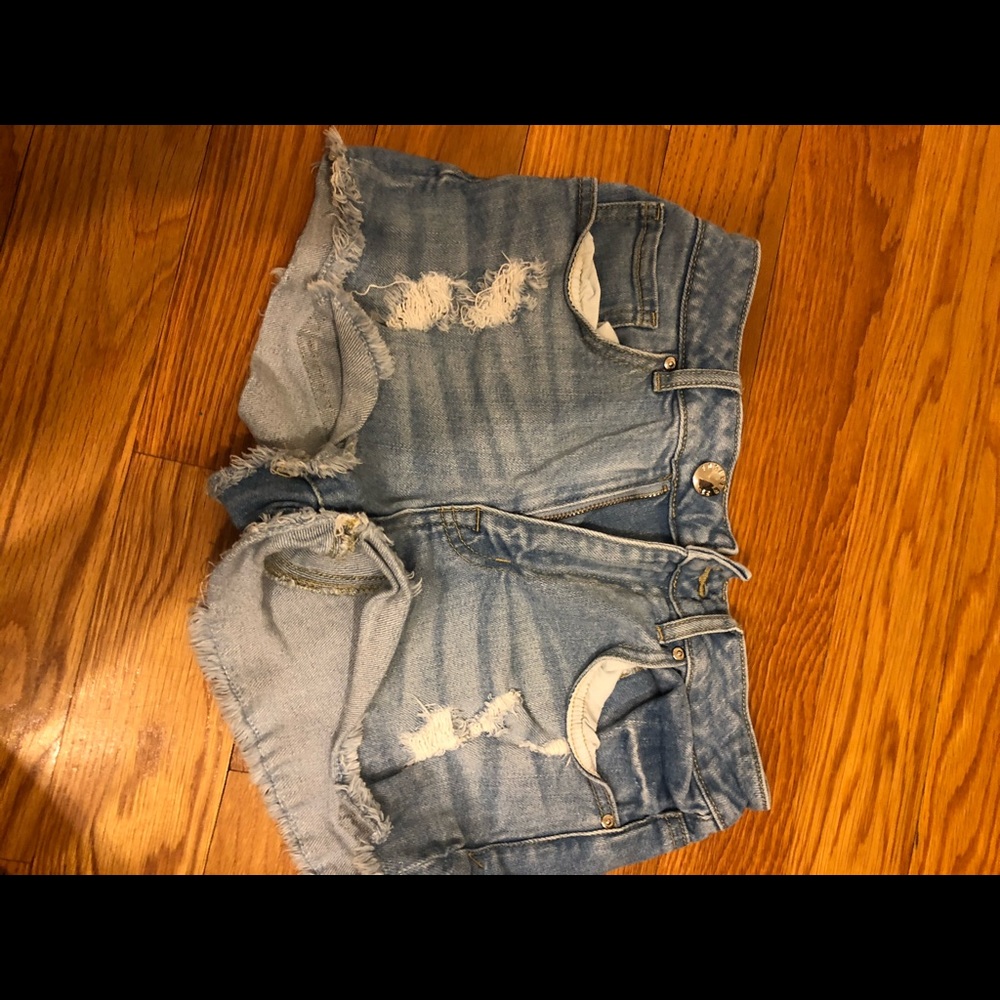 light blue ripped jean shorts